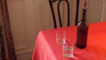 The nice way to serve bottled water: pour tap water into a beautiful carafe/glass bottle et voila! 