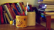 Upcycling can be super simple- making boxes for pencils out of jars and cans