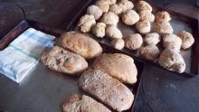 For a big house with many people, plenty of fresh bread is made for breakfast